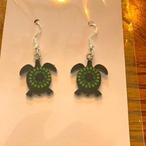 12.      “Turtle” earrings.